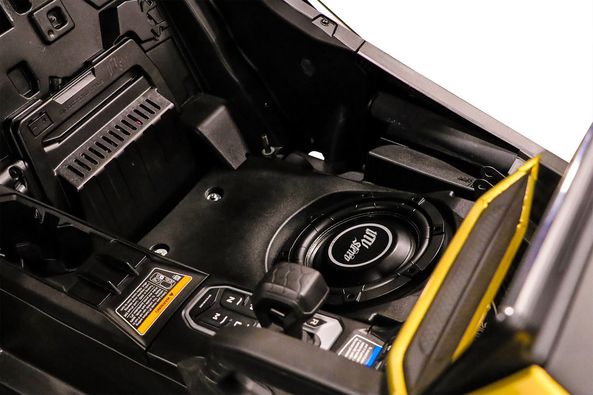 UTV Stereo subwoofer installed in vehicle center console