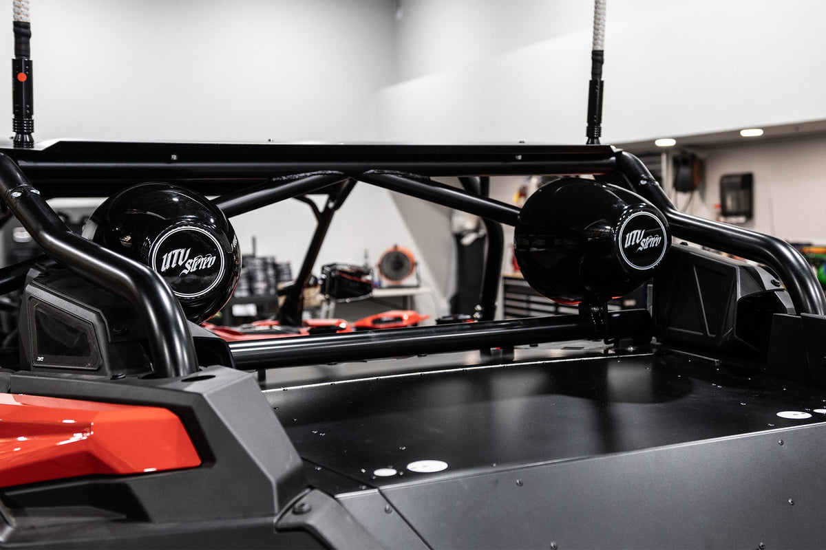 UTV Stereo pod speakers mounted on a roll cage
