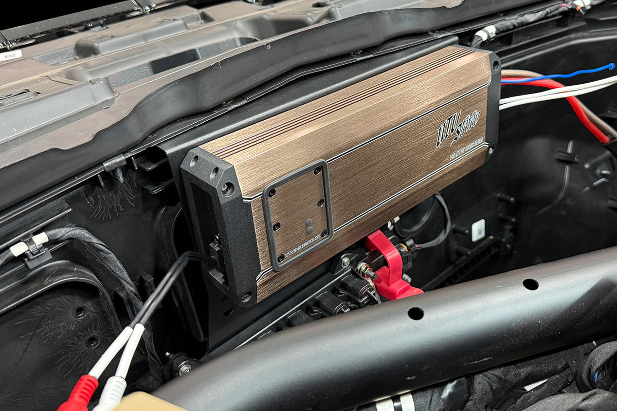 UTV Stereo Elite Series amplifier mounted in a vehicle engine bay