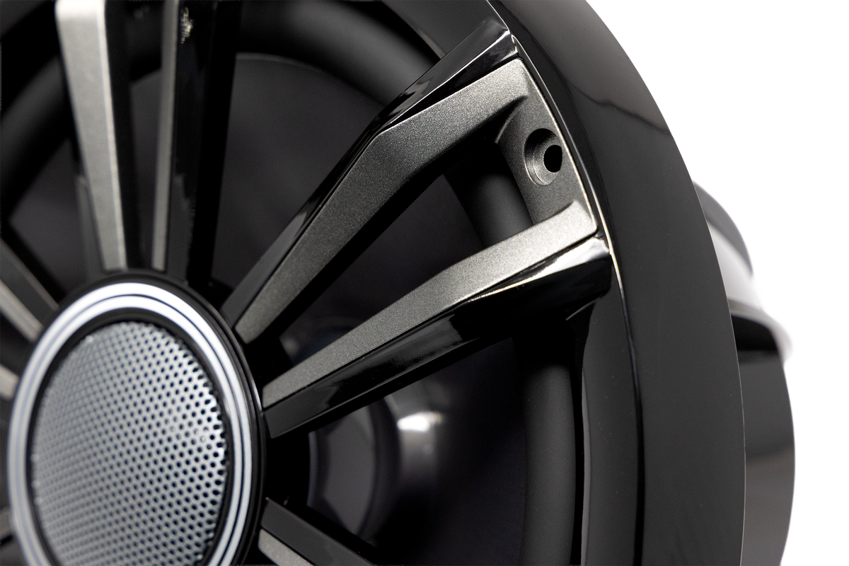 UTV Stereo black and silver speaker grille close up