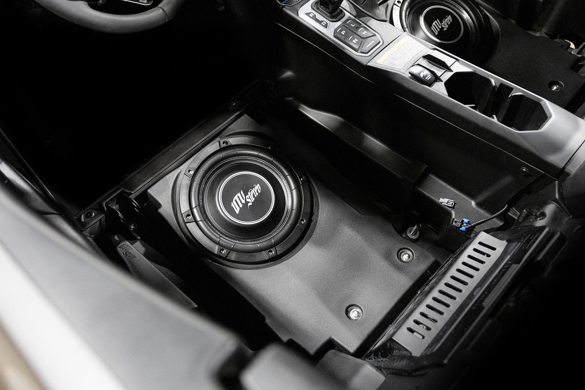 UTV Stereo subwoofer installed in vehicle center console