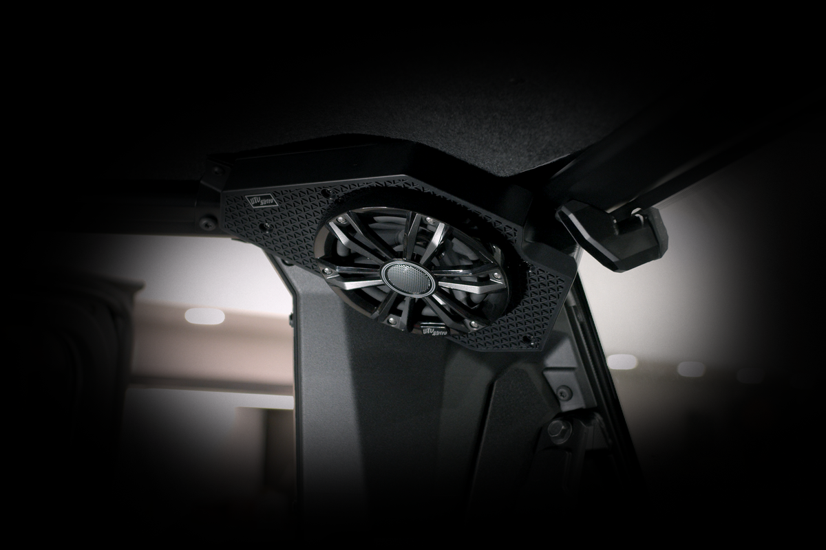 UTV Stereo speaker mounted on the roll cage of a vehicle